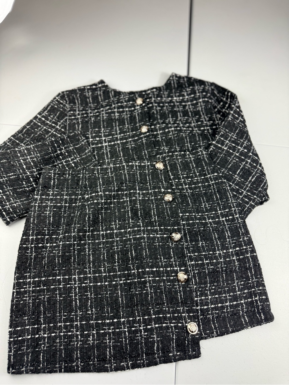 Shown women’s Classic Black & White Tweed blazer and skirt with Pearl Buttons